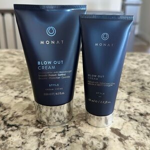 Monat blow out cream large 4.0 oz and travel size 2.0 oz.